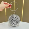 Borsa da sera sferica in strass argento motivo rosa minaudière cristallo con manico anello - Nero