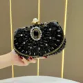 Schwarze Perlen Abendtasche mit Perlenverschluss und Kette für Party, elegante Strass Clutch. - Schwarz