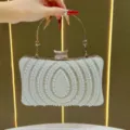 Elegant white pearl evening clutch bag with metal handle and rhinestones for women parties. - Silver