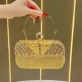 Borsa pochette da sera con strass dorati e frange e manico in metallo per feste donna. - Oro