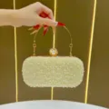 Elegante borsa da sera con perle da donna, pochette rigida con manico dorato accessorio. - Oro
