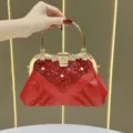 Stunning red evening clutch bag with sparkling rhinestones, elegant gold handle and chic design. - Red
