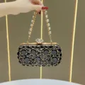 Elegante borsa da sera nera in cristallo con tracolla in strass per abiti da festa. - Nero