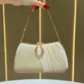 Elegante borsa da sera con chiusura a goccia di strass e catena per occasioni speciali. - Albicocca