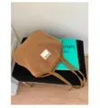 Stylish fuzzy tote bag detail view, soft plush shoulder bag with label, casual daily handbag. - Shoulder Bag Style / Brown