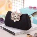 Elegante zwarte glitter avondtas met sprankelende strass metalen sluiting voor feestjes. - Zwart