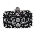Zwarte satijnen avondtas clutch met fonkelende strass steentjes en bloem metalen sluiting. - Zwart