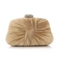 Gold pleated satin evening clutch detail showcasing the delicate crystal clasp and texture. - Apricot