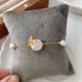 Zartes S925 Silber Armband mit funkelndem Zirkon Kristall und filigranem Schmetterling. - Schmetterling Armband (XB208-DH) / 925er Silber / Weißer Zirkon / Gold