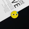 Detailed close-up shot of the cute yellow sweating emoji metal enamel pin badge accessory. - Yellow Sweat Face Emoji(R898)