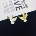 Detailed view of the elegant peace dove enamel pin, showing front design and back clutch. - Peace Dove Style (R411)