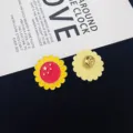 Patriotic sunflower enamel pin with red star design, stylish metal brooch badge. - Sunflower and Star Style (R412)