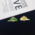 Detailed shot of metal enamel pin featuring leaf and pink flower design, showing front and back. - Flower and Leaf Style (R413)