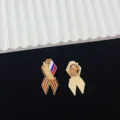 George ribbon lapel pin badge retro metal brooch detail view showcasing front and back. - R328