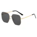Elegante Metall Sonnenbrille mit polygonalen Gläsern für einen stilvollen Sonnenschutz. - Goldener Rahmen Schwarzgraue Linse