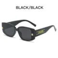 Schwarze quadratische Sonnenbrille für Damen, dicker Rahmen mit goldenen Bügeldetails. - Schwarzer Rahmen