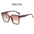 Klassische Oversize Sonnenbrille für Damen, modische Farbverlauf Gläser und roter Rahmen. - Dunkelteerahmen Tee Verlauf