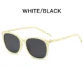 Modische runde Damen-Sonnenbrille mit UV400-Schutz, stilvolles weiß-schwarzes Rahmendesign. - Rahmen in Off-White Graue Linse