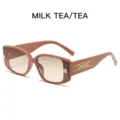 Chic brown square sunglasses with gradient lenses and stylish gold temple details. - Rosy Pink