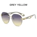 Rahmenlose Sonnenbrille mit grau-gelben Farbverlaufsgläsern und goldenen Metallbügeln für Damen. - Grau-Gelb Verlauf Linse