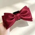 Molletta per capelli con fiocco in raso bordeaux per eleganti acconciature donna. - Rosso