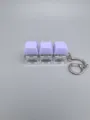 Porte-clés jouet de décompression à interrupteur mécanique avec touches violettes. - Macaron 3 touches (Violet Taro)