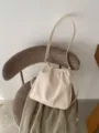 Casual minimalist cloud bucket bag for women, stylish pleated design, versatile shoulder bag. - White