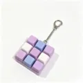 Cute 9-key mechanical keyboard fidget toy keychain in colorful pastel shades. Stress relief. - Model 00910 / With LED Lights
