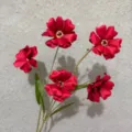 Close-up shot of artificial red buttercup flowers detail, showing exquisite fabric petals. - Bright Red