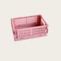 Panier de rangement pliable en plastique rose pour papeterie de bureau, cosmétiques et petits objets. - Rose