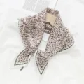 Stylish pleated leopard print neck scarf with green border, elegant accessory for women. - Off-White