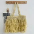 Sac cabas tissé en paille d'été avec détail de franges, idéal pour vacances plage et travail quotidien. - Beige
