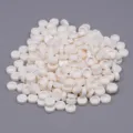 Detailed view of white small round particles, ideal DIY craft filling and accessories. - 100g Pack (Approx 900 Pcs) / Cream White