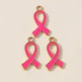Pink enamel ribbon charm detail shot, ideal for DIY bracelets and keychains decoration. - Pink