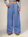 Vista detallada de pantalones de chándal amplios de felpa para mujer con cintura. - Azul cielo