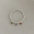 Eleganter silberner Perlenring mit drei bunten Edelstein-Anhängern für Damen Schmuck chic. - Verstellbare Offene Größe / Bunter Facettierter Edelstein-Anhänger-Stil