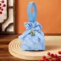 Blue fabric wedding candy gift bag with handle and bow, elegant favor pouch for engagement party. - Light Blue + Square Xi
