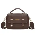 Retro brown leather saddle bag for women with top handle and crossbody strap stylish purse. - Coffee
