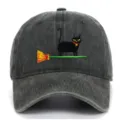 Close-up view of the cute black cat and broom embroidery detail on the vintage cap. - One Size / Army Green