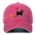 Detailed view of vintage washed pink baseball hat featuring cute black cat embroidery, sun shade. - One Size / Rose Red