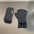 Striped knit scarf and fingerless gloves set for women, cozy winter fashion accessory. - Scarf and Glove Set / Blue