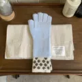 Light blue knitted warm gloves with retro polka dot cuffs for women winter daily wear. - Gloves / Off White