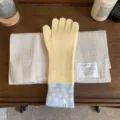 Cozy knitted winter gloves with stylish polka dot cuffs, warm and retro fashion accessory. - Gloves / Light Blue Yellow