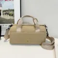 Casual khaki cylinder shoulder bag, lightweight canvas travel crossbody bag with top handle. - Khaki