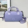 Sac à bandoulière violet léger sac polochon décontracté pour les voyages quotidiens. - Violet