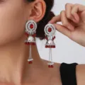 Detailed view of ethnic red beaded jhumka earrings with silver hollow disc and sparkly rhinestones. - Bell Tassel Drop Earrings / Red (S5111-7)