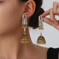 Exquisite antique gold rhinestone bell jhumka earrings detailed close up view for women. - Gold