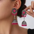 Boho silver jhumka earrings with pink stone and bead fringe ethnic jewelry detail view - Rose Red
