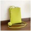 Green minimalist crossbody phone bag with stylish knot strap design for women daily commuting. - Green