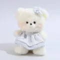 Süße weiße Plüschbärpuppe mit blauem Blumenkleid und Haarschleife, Stofftier Detailansicht. - 20cm / Bär (Blaues Kleid) / Creme